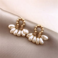 FLEUR | PEARL FLOWER HOOP EARRINGS