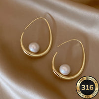 SELENA | CRESCENT PEARL HOOP EARRINGS